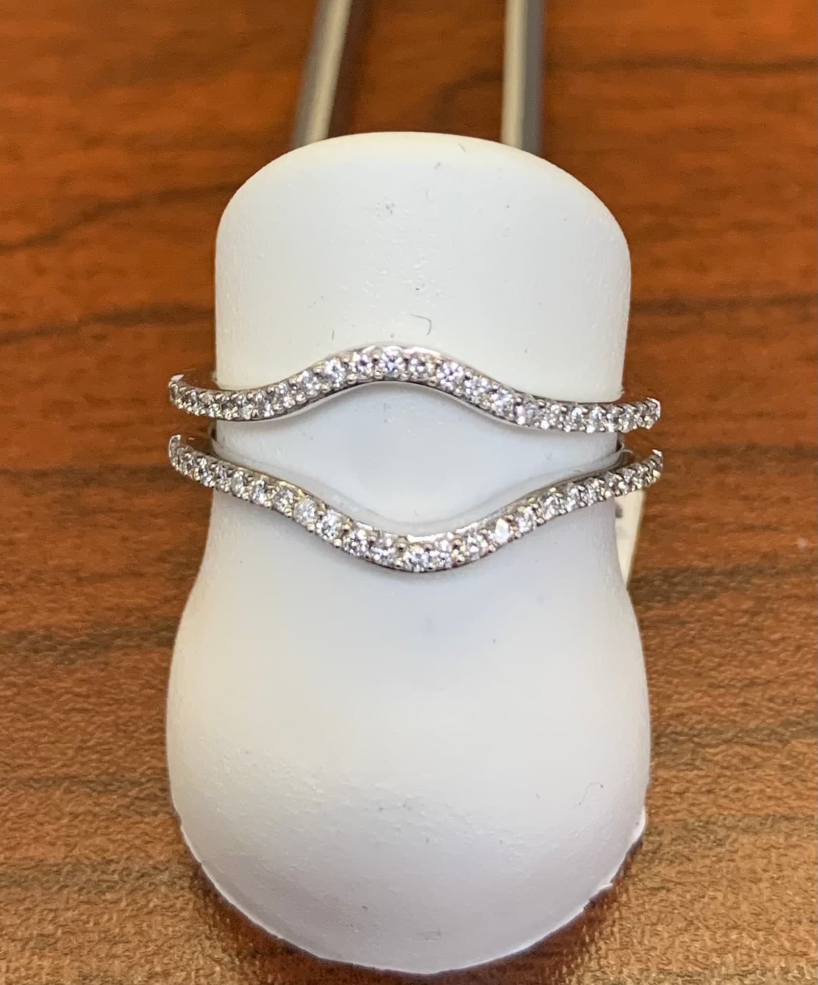 Pair of contoured pavé wedding bands