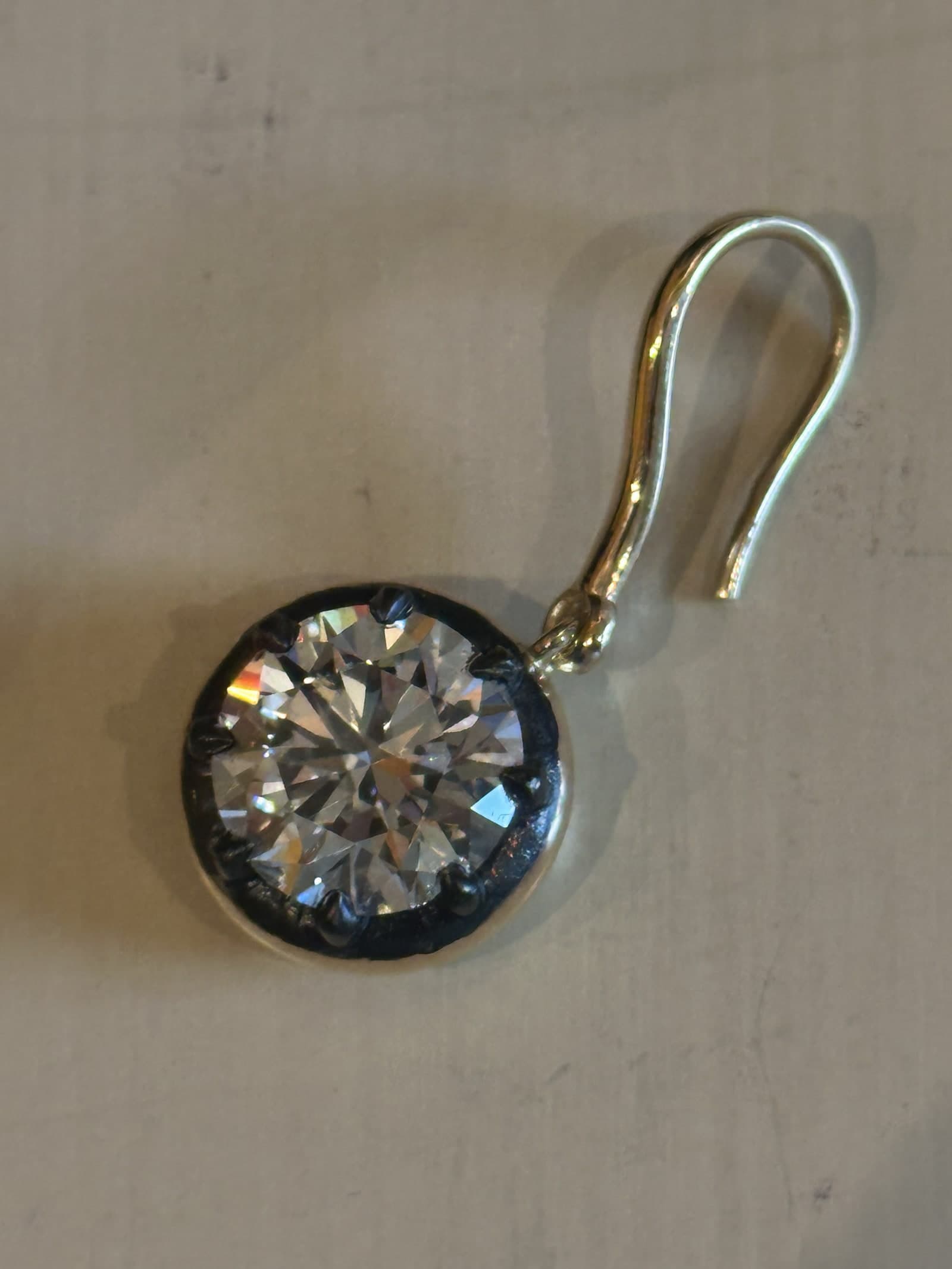 Round brilliant diamond stud earring close-up