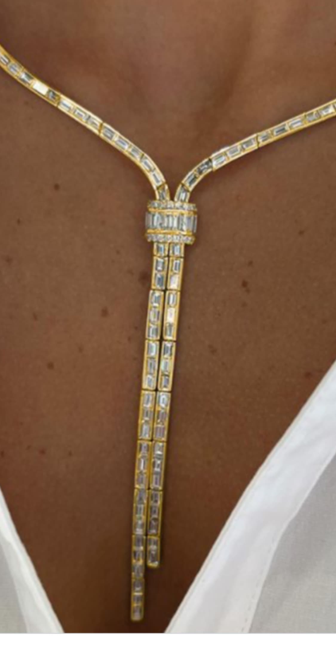 Baguette diamond lariat necklace in yellow gold, sourced by Cool Blue Diamond