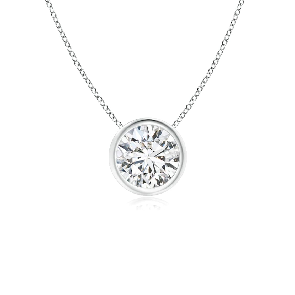 A bezel-set round brilliant diamond pendant on a fine chain